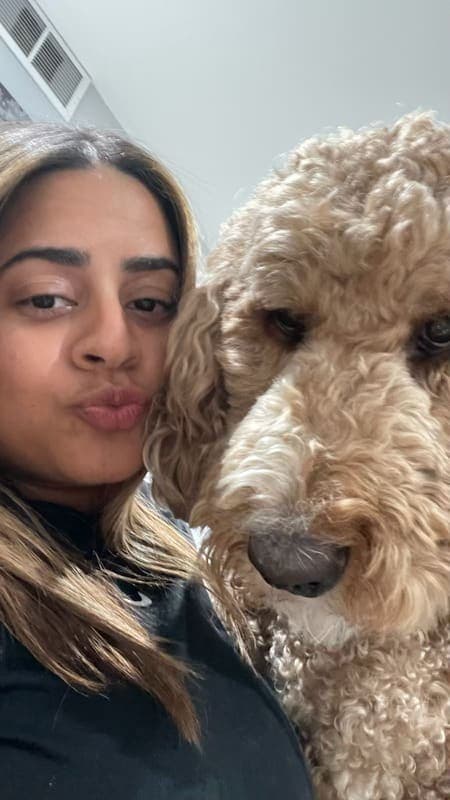 Bianca with a curly-haired doodle